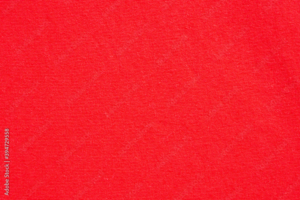 Fototapeta premium Red fabric cloth texture background close up