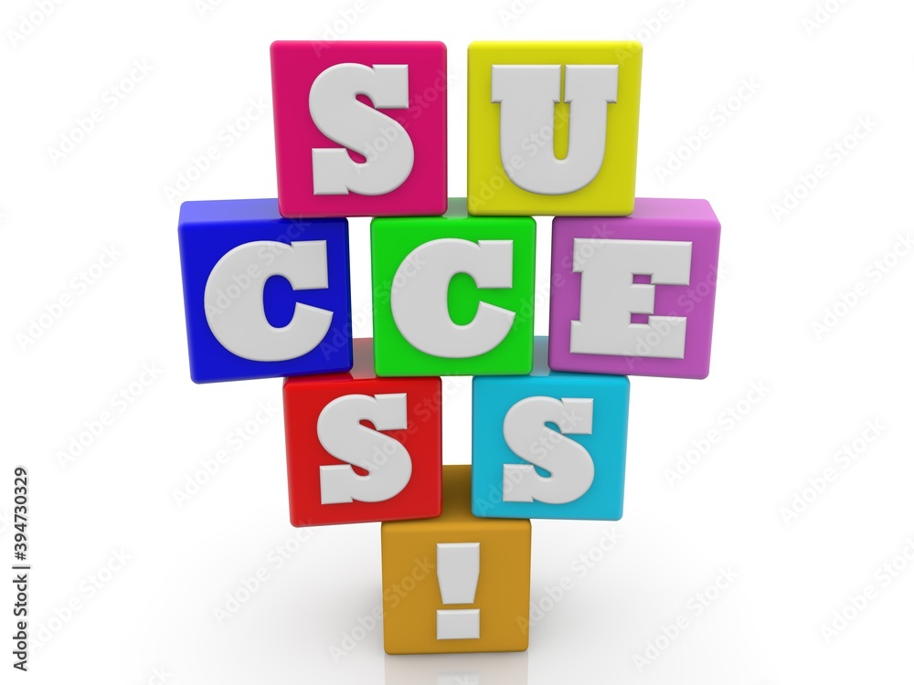 SUCCESS concept on colored toy blocks SUCCESS concept on colored toy blocks