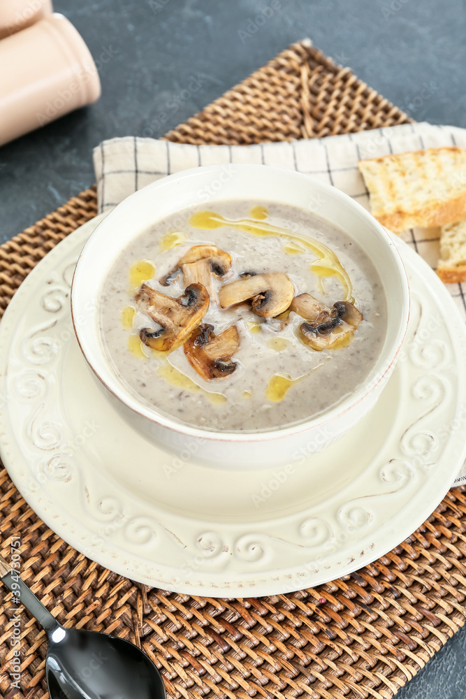 Bowl of tasty mushroom cream soup on table Bowl of tasty mushroom cream soup on table