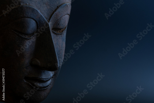 .face of a smiling buddha