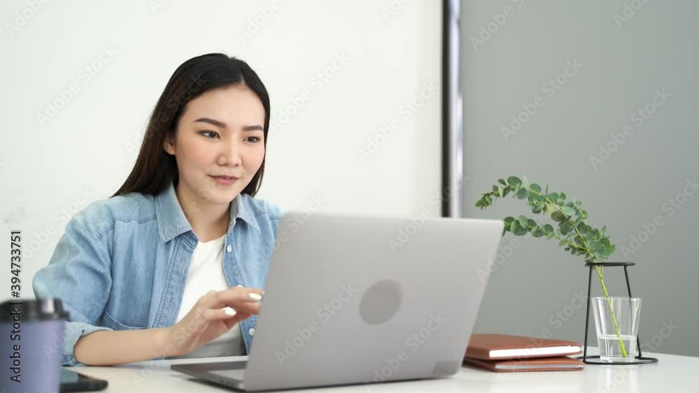 Surprised asian woman looking on laptop, Online watching a good news with internet connection. Surprised asian woman looking on laptop, Online watching a good news with internet connection.