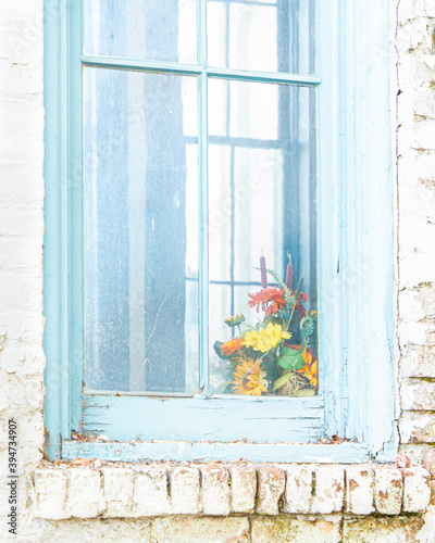 Hi Key Image of Silk Flowers in a Window