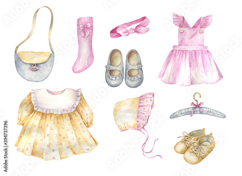 Watercolor illustration of baby clothes for a girl. dress shoes