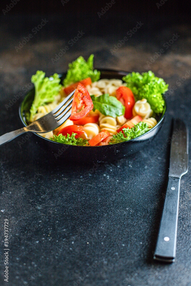 pasta salad fusilli tomato snack vegetable lettuce healthy gluten free ingredient vitamin top view copy space for text food background pasta salad fusilli tomato snack vegetable lettuce healthy gluten free ingredient vitamin top view copy space for text food background