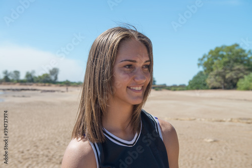 Indigenous teenager at the beach photo