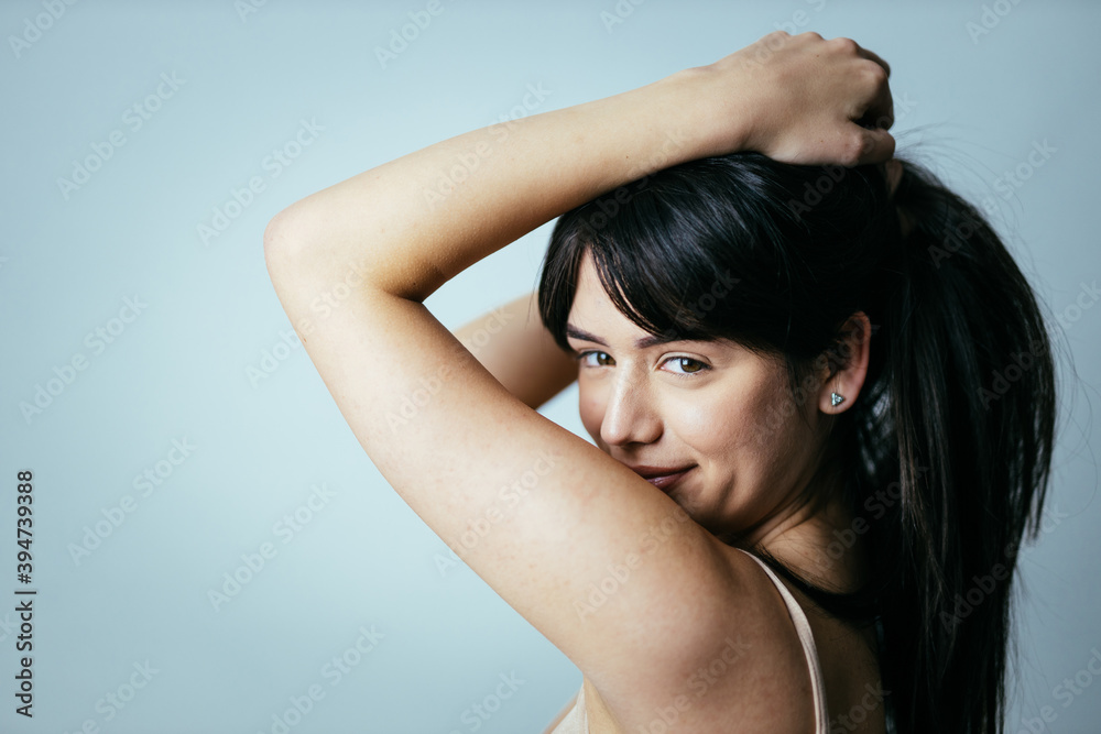 Beautiful girl posing in studio for a Beautiful girl posing in studio for a