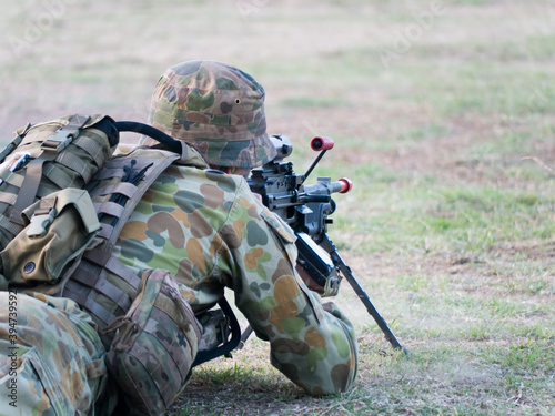 Australian Army Reserve Exercise - Soldier Lying with Gun photo