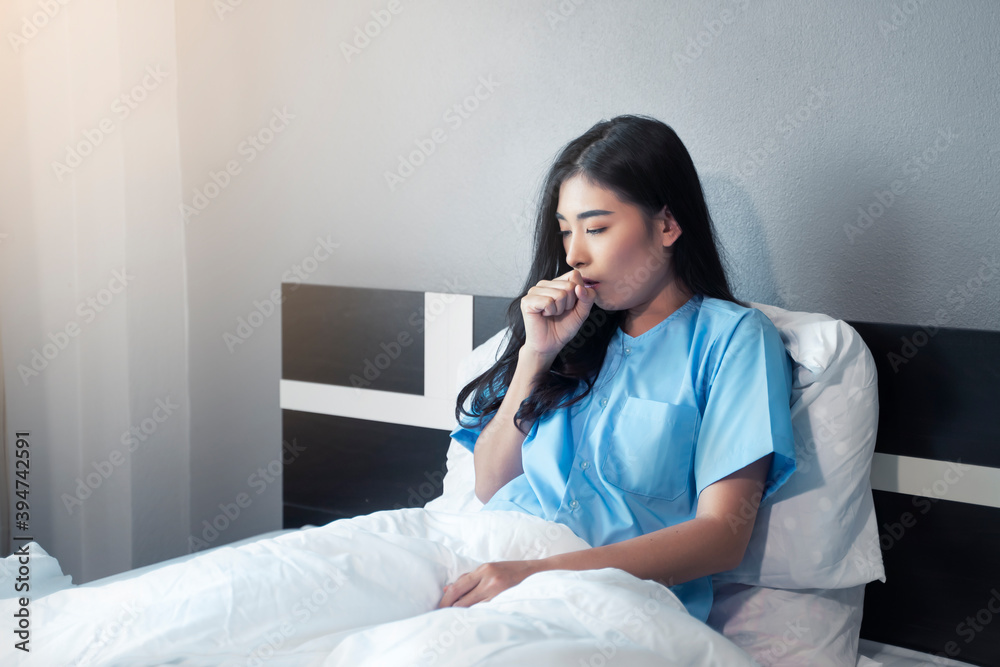 Asian woman patient resting in bed at hospital private room with illness disease sickness unhealthy mind, panic patient in medical health care insurance, feeling loneliness sad depression unhappy Asian woman patient resting in bed at hospital private room with illness disease sickness unhealthy mind, panic patient in medical health care insurance, feeling loneliness sad depression unhappy