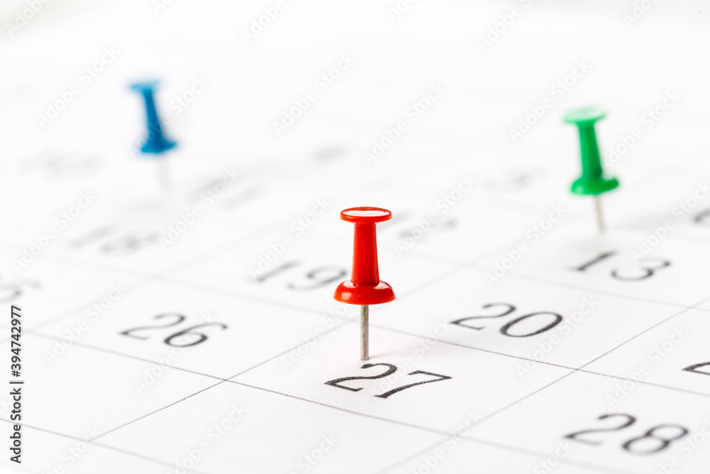 Push pins on calendar. Idea concept of to do planning. Push pins on calendar. Idea concept of to do planning.
