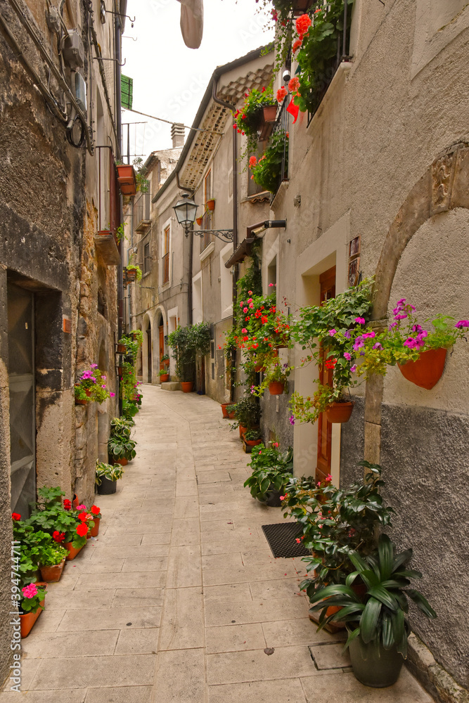 A narrow street among the old houses of Pacentro, a medieval village in the Abruzzo region.