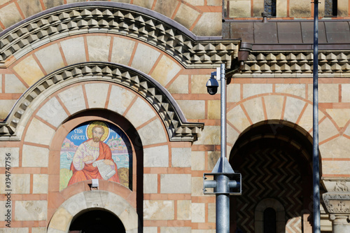 A surveillance camera is seen in front of St. Mark's orthodox church located in Tasmajdan park, city of Belgrade, Serbia. photo