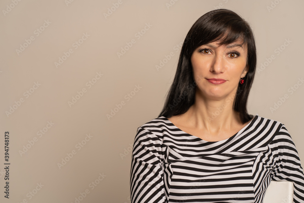 Fototapeta premium Brunette girl makes faces on camera