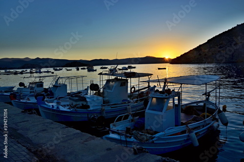 Greece-view on the sunrise in harbor in Tolo