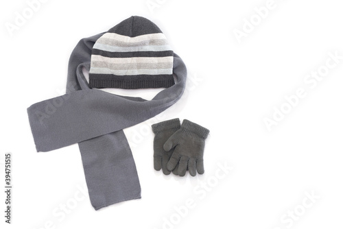  hat, gloves, scarf isolated on white background.