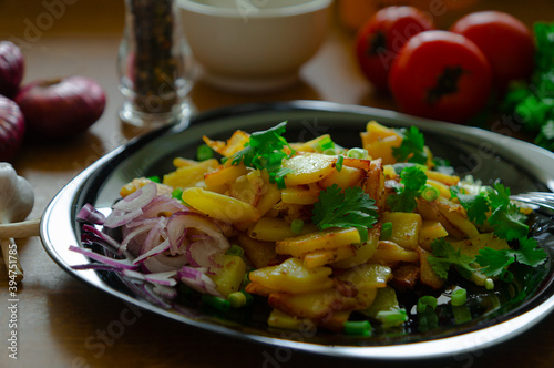 Fried potatoes with onions and cilantro