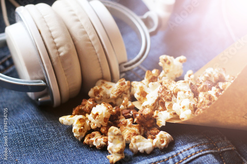 Big white headphones and popcorn photo