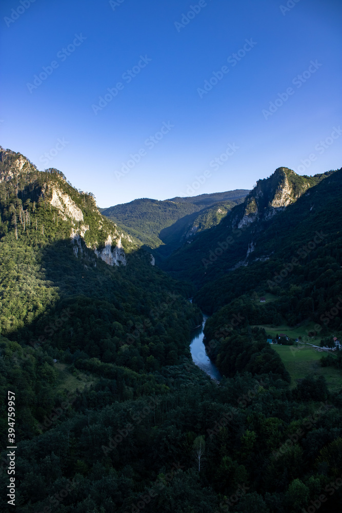 Montenegro. Picturesque canyon of the Tara river.Mountains surrounding the canyon.Forests on the slopes of the mountains.