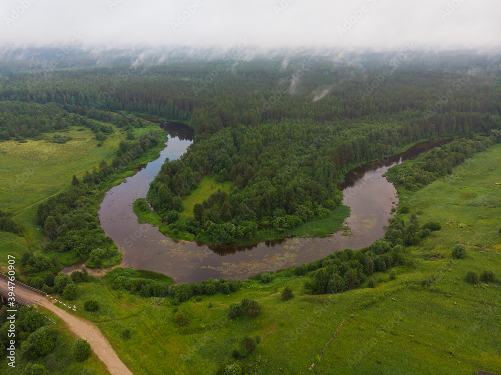Bend in the river. The turn of the river. Russia, Velsky district, Puya river