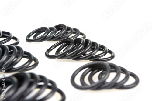 several sealing rings of different sizes in black close-up