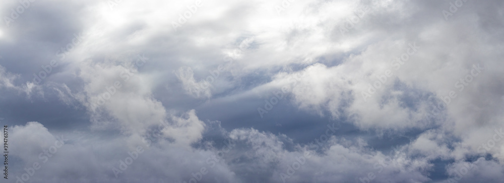 Cloudy sky with dramatic rain clouds, panorama