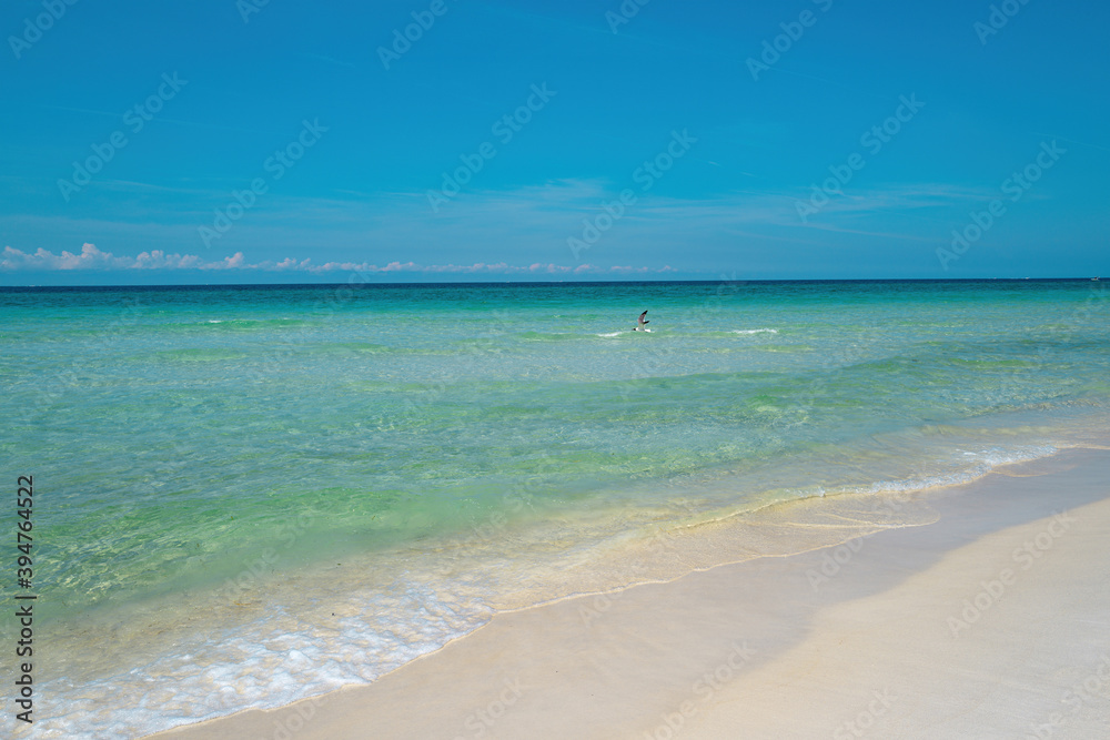 Summer beach and sea. Perfect ocean background. Beautiful sea wave and blue sky. Summer beach and sea. Perfect ocean background. Beautiful sea wave and blue sky.