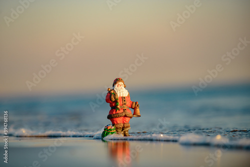 Santa copy space. Holiday greeting card. Happy New Year and merry Christmas travel, tropical vacations concept.