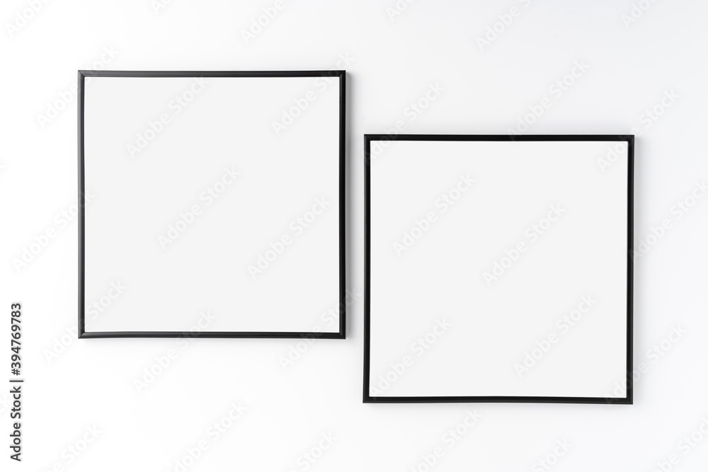 Two picture frames on white background. Mockup with copyspace Two picture frames on white background. Mockup with copyspace