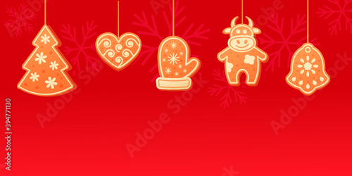 christmas background with gingerbread cookies and snowflakes herringbone, heart, bull, bell, mitten