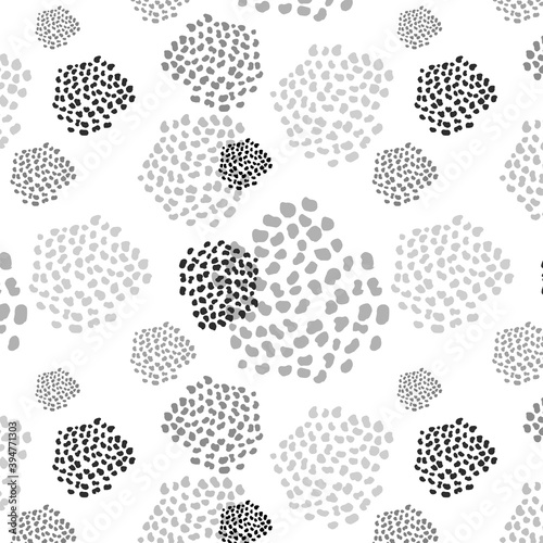 Seamless pattern with balls of dots, and an abstract pattern similar to spots on animal skins for textiles, upholstery, paper