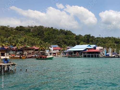 Houses on the water near main pier. Koh Rong island. Cambodia. South-East Asia