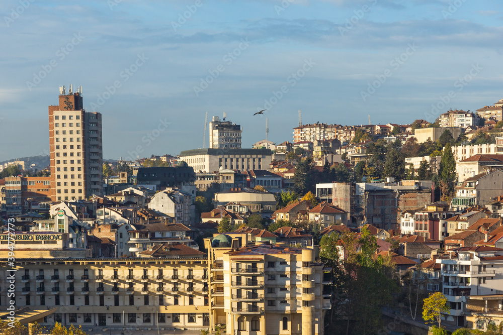 Fototapeta premium VELIKO TARNOVO, BULGARIA -NOVEMBER 2, 2020: Amazing Sunrise view of city of Veliko Tarnovo, Bulgaria