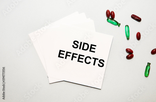 Side EFFECTS text, green and red capsules next to you, are on the note cards.