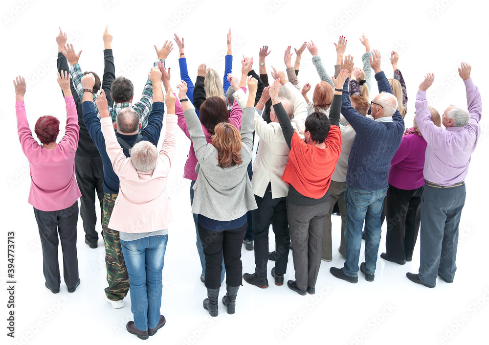 Obraz premium top view. group of diverse adults pointing at a white screen.