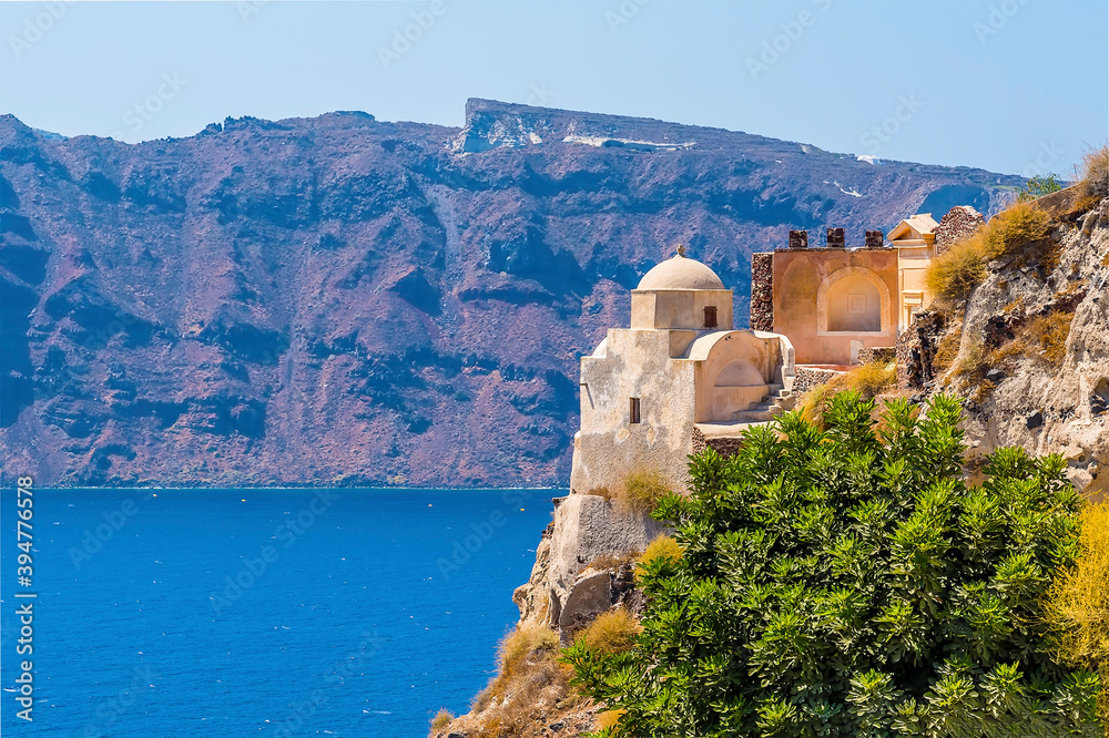 A view towards the castle in the village of Oia, Santorini in summertime