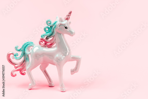 Beautiful pearl unicorn against pink background. Invitation, birthday, bachelorette party, baby shower concept.