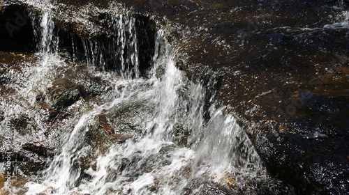 water flowing from a waterfall