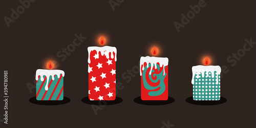 A set of Christmas glow candles on a dark background with lighting. Red-white, green candles. Candles with stars, dots and abstract drawings by hand. Vector illustration