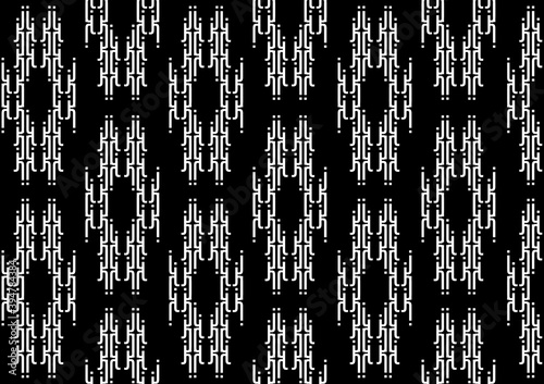 Abstract black and white wallpaper pattern made of alphabet lettering j
