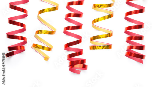 Red And Gold Serpentines Isolated Over White