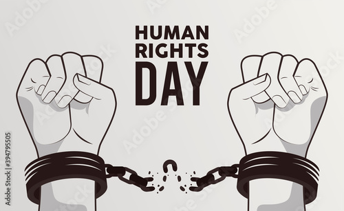 human rights day poster with hands breaking handcuffs