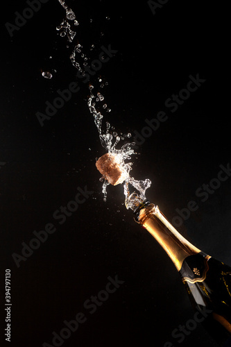 Valentine's day and Happy New Year theme with splashing champagne