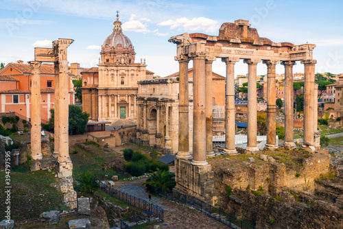 Panorama of roman forum the heart of roman empire. From the Campidoglio they can be seen the Arch of Severus, the temples Saturn , Basilica of Maxentius, Arch of Titus, Colosseum Rome, Italy.