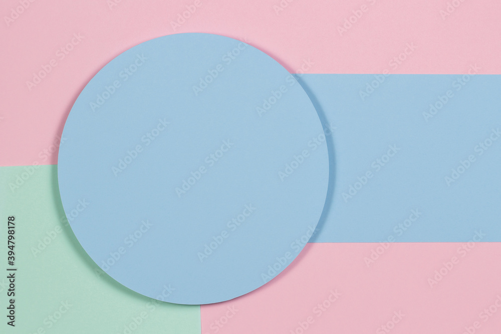 Abstract geometric texture background of soft green, pastel pink, light blue color paper. Top view, flat lay