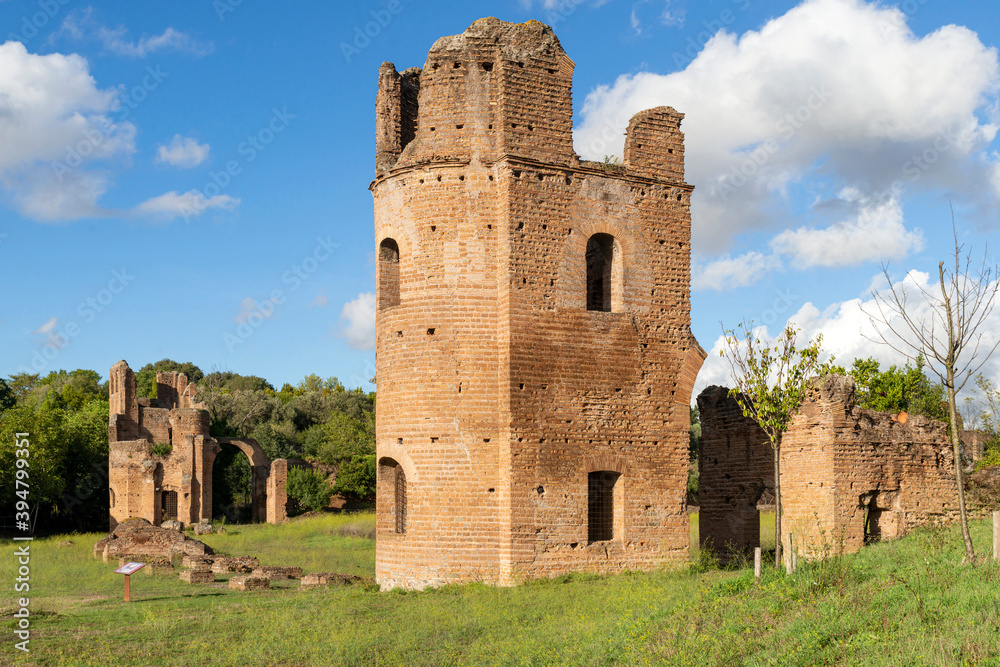 Particular of Tower in the Cirrcle of Massenzioin appian way with a beautiful blue sky and clouds. Rome, Italy. Particular of Tower in the Cirrcle of Massenzioin appian way with a beautiful blue sky and clouds. Rome, Italy.