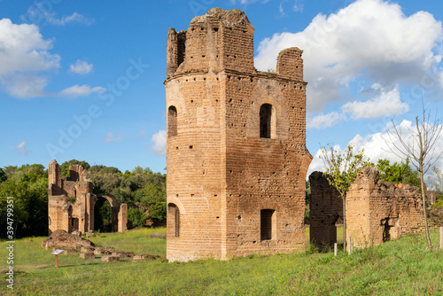 Particular of Tower in the Cirrcle of Massenzioin appian way with a beautiful blue sky and clouds. Rome, Italy.