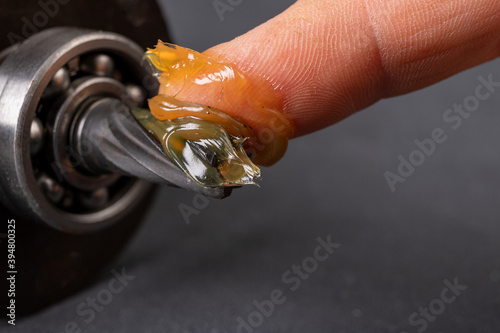 Grease lubrication of the bearing and the pin of the electric rotor. Service work of engine parts.
