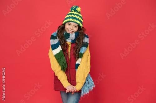 stylish child in knitwear care health in cold season, knitted garments