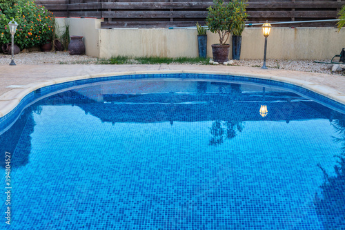 Blue water swimming pool close up view