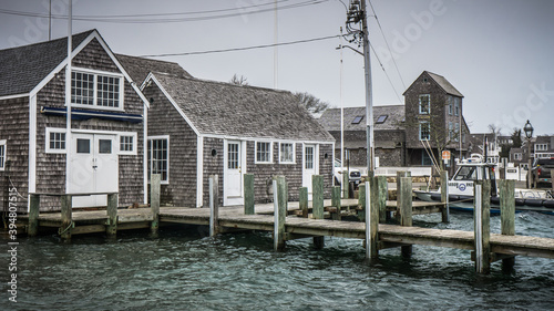 small port and typical Cape Cod architecture, with houses covered with clapboard photo