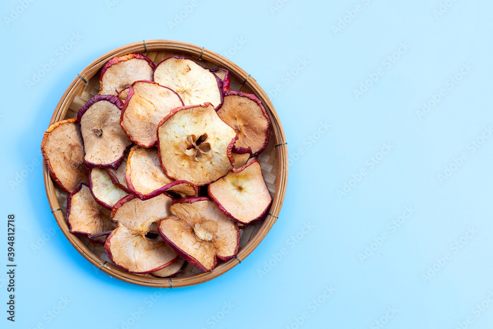Dried apple slices on blue background Dried apple slices on blue background